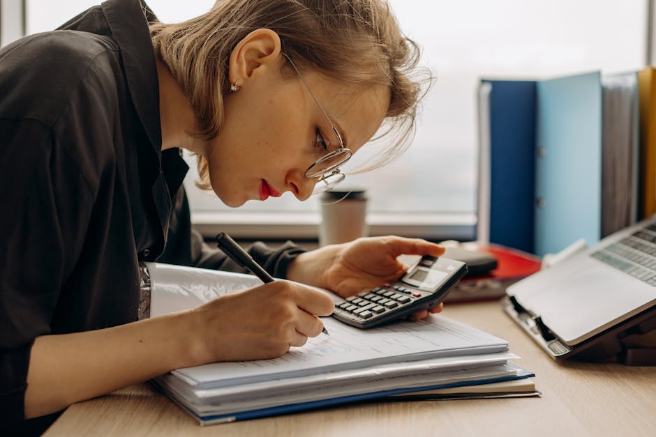 Bookkeeping spreadsheet template being completed by a sole trader